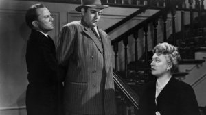 Raymond Burr as Kerric, Marjorie Rambeau as Leona Donner, and her chauffeur played by David Clark  